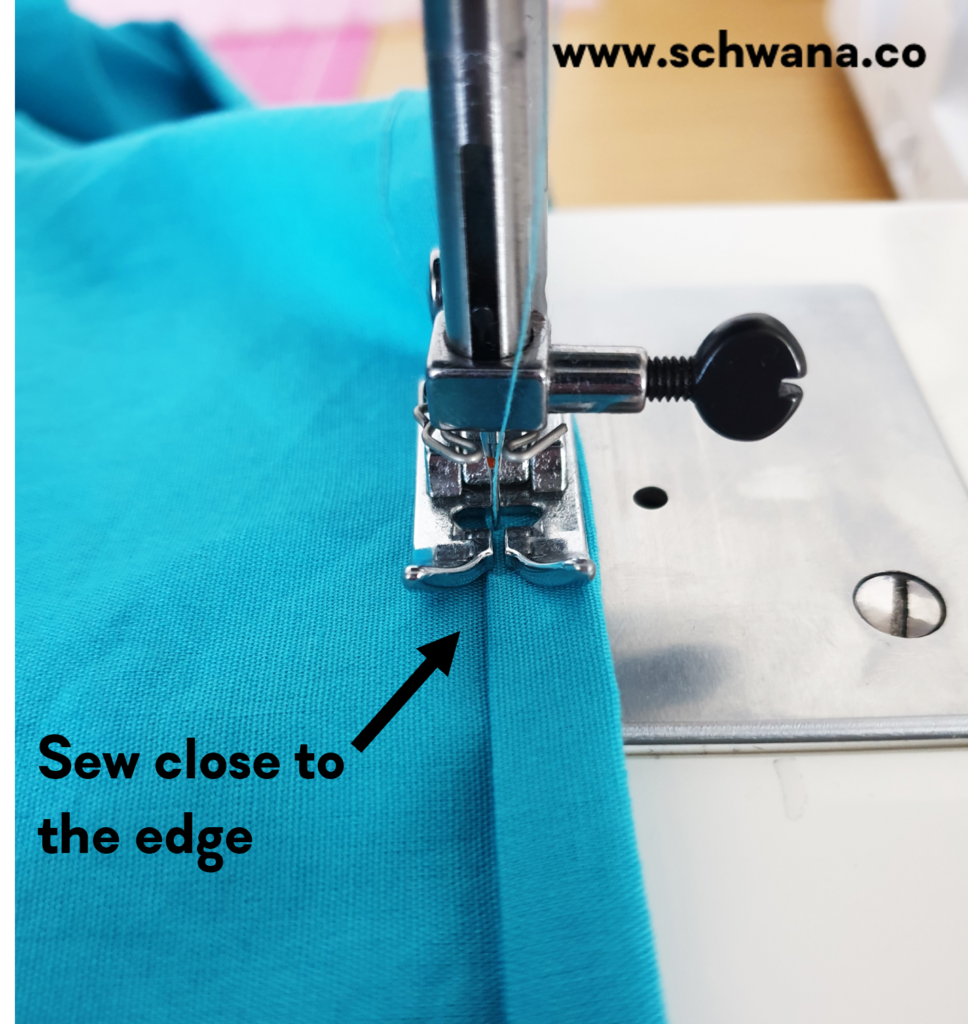Sewing the hem.